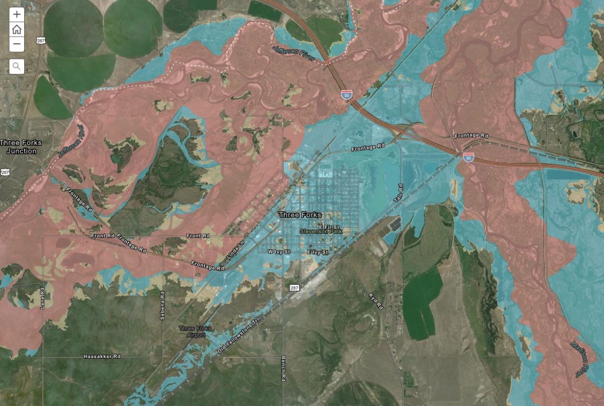 Image of proposed new maps overlaying Three Forks - floodWAY penetrates within the city limits on the west side of town